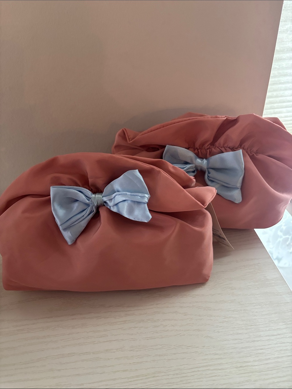 Coral Cosmetic Pouch with Light Blue Bow